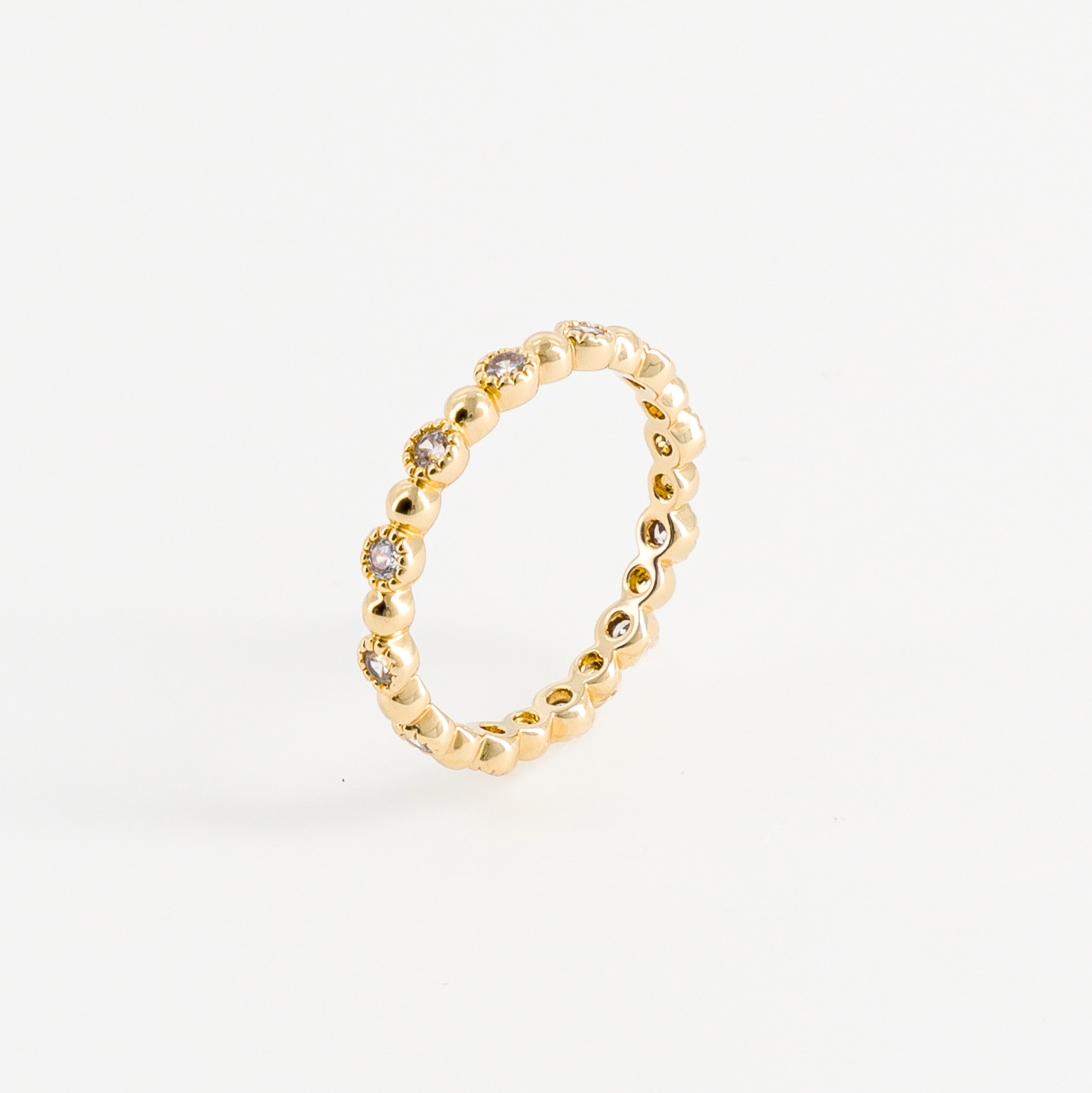 Thin gold-plated ring, side view