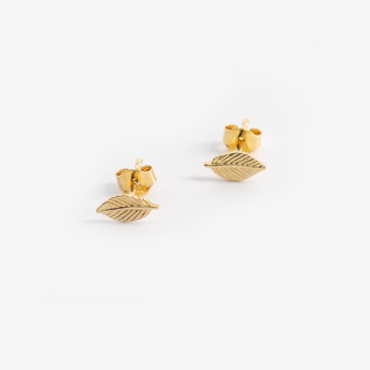 gold-plated leaf earrings