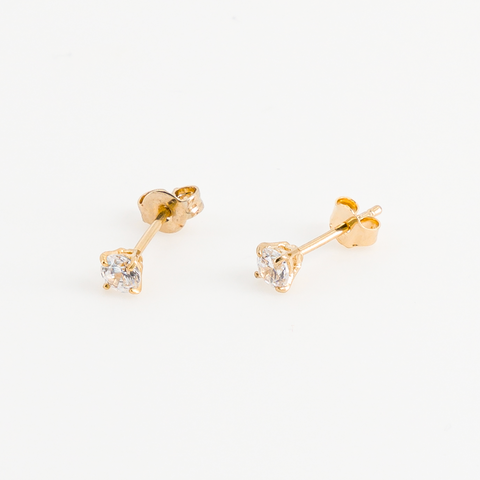 Puces d'oreilles diamant plaqué or vue de côté