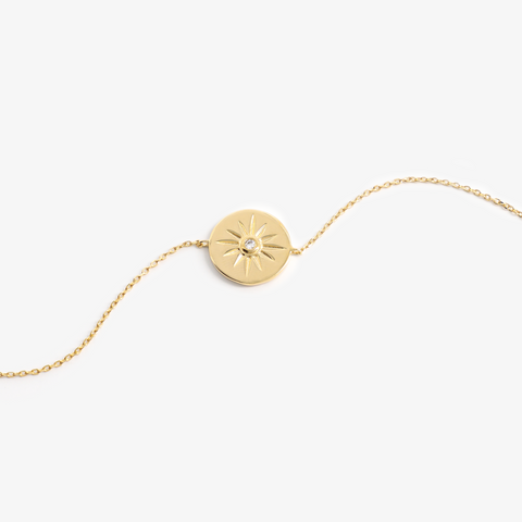 Bracelet avec pendentif rond plaqué or
